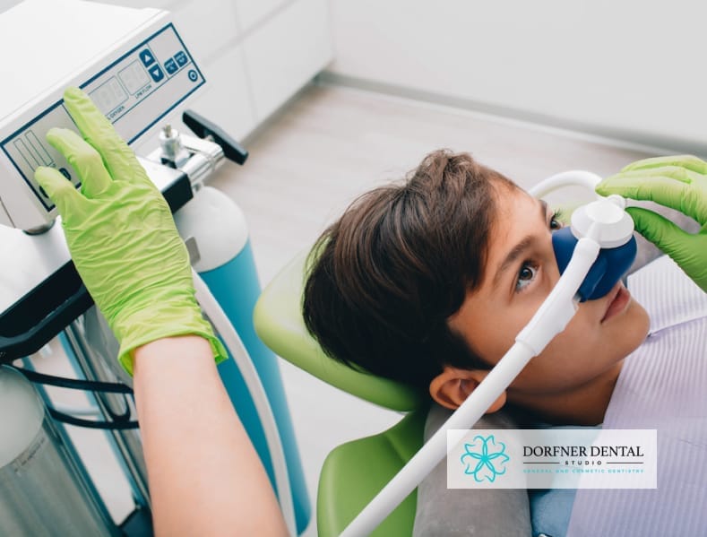 A young boy receiving dental treatment under sedation, ensuring a comfortable and anxiety-free experience during the procedure.